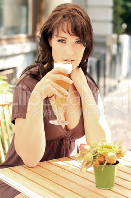 young beautiful brunette with a beer glass