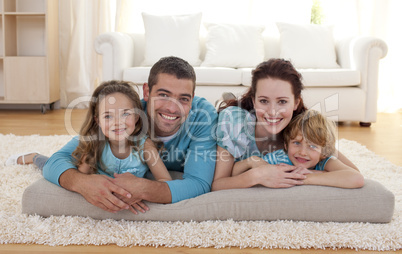 Family on floor in living-room