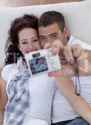 Couple playing with a camera