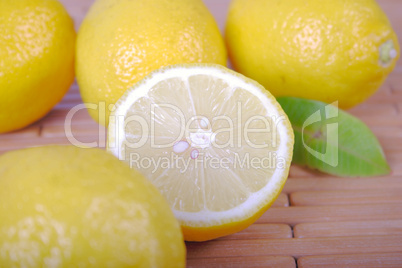 Lemons lying on a wooden napkin