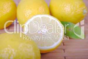 Lemons lying on a wooden napkin