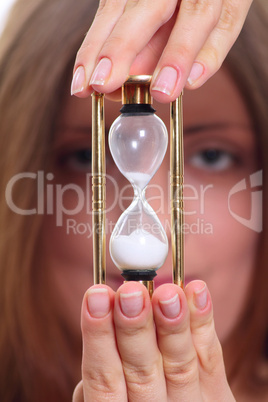 The girl with a sand clock