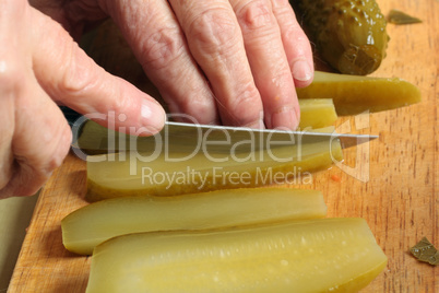 chopping cucumbers