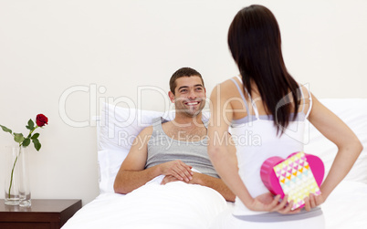 Woman giving a man a valentine's present
