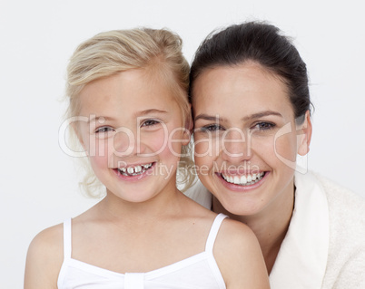Portrait of mother and daughter in bathroom