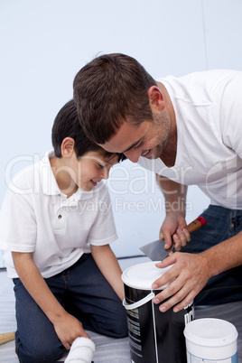 Father and son preparing paint