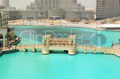 Bridge over artificial lake in Dubai downtown, UAE