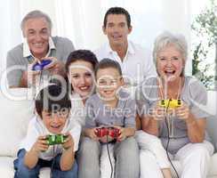 Family playing video games at home