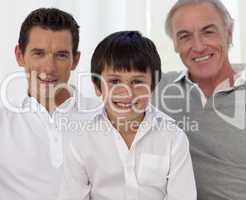 Smiling son, father and grandfather