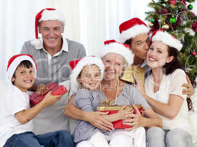 Family giving presents for Christmas