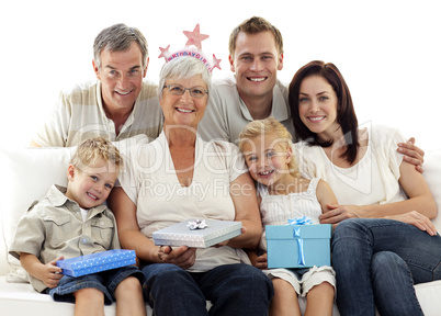 Family celebrating grandmother's birthday