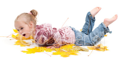 Toddler with maple leaves