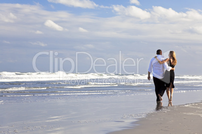 Man and Woman Couple Romantic Walk On A Beach