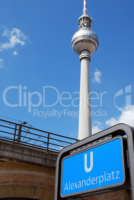 berlin television tower and metro sign