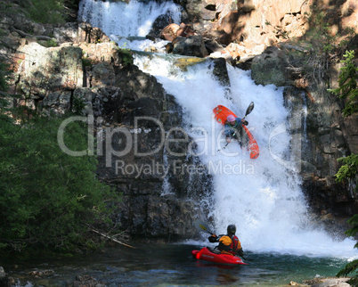Kayaking On A Mountain Waterfall