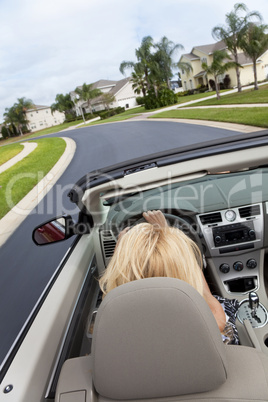 Beautiful Young Woman Driving Convertible Car Wearing Sunglasses