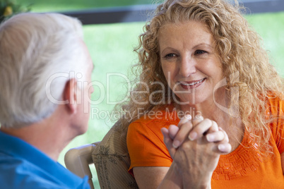 Senior Man and Woman Couple Holding Hands