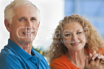 Senior Man and Woman Couple Holding Hands