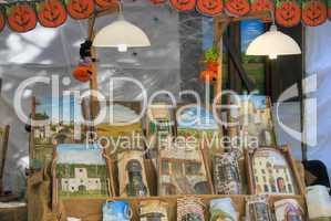 Paintings in a Market, Lucca, Italy