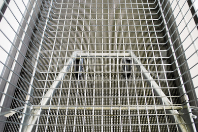 shopping cart on escalator