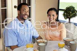 Happy African American Couple Sitting Outside Having A Healthy B