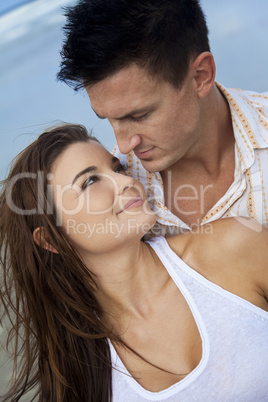 Romantic Man and Woman Couple On A Beach
