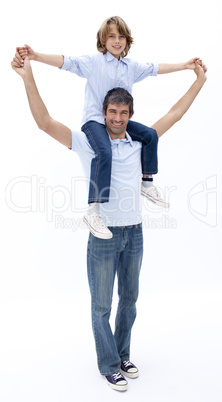 Father giving son piggyback ride