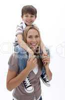 Mother giving son piggyback ride