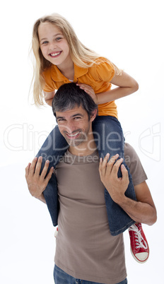 Father giving daughter piggyback ride against white