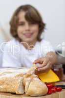 Close-up of child's hand taking bread