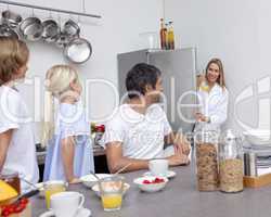 Family preparing breakfast in the kitchen