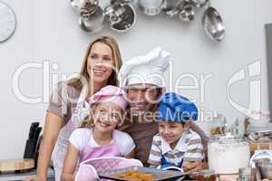 Happy family baking in the kitchen