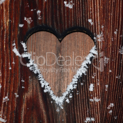 Holzhintergrund mit Schneeflocken