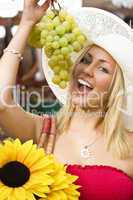 Eating Grapes In The Market