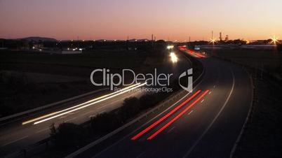 Time lapse of highway at sunset