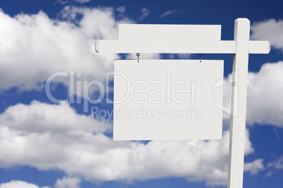 Blank Real Estate Sign on Clouds & Sky Background