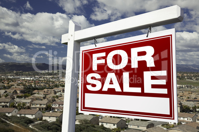 For Sale Real Estate Sign with Elevated Housing Community View