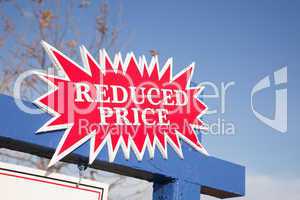 Red Reduced Price Burst Sign