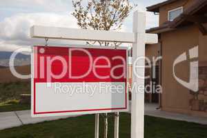 Blank Real Estate Sign in Front of House