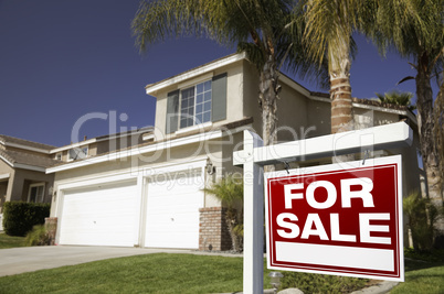 Red For Sale Real Estate Sign and House