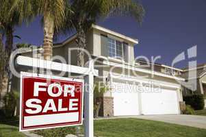 Red For Sale Real Estate Sign and House