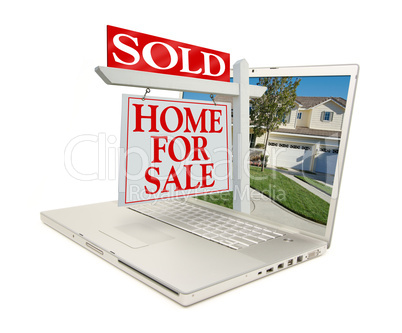 Sold Home for Sale Sign & New Home on Laptop