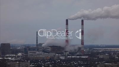 Pipe with smoke in winter environment time lapse