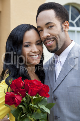 Romantic African American Couple With Bunch Of Roses