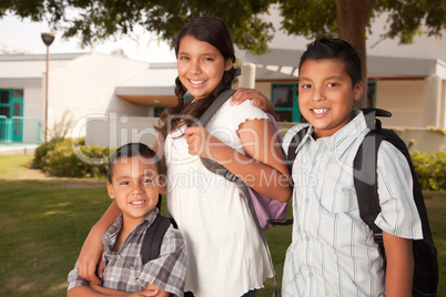 Cute Brothers and Sister Ready for School