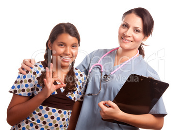 Pretty Hispanic Girl and Female Doctor Isolated