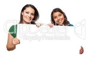 Pretty Hispanic Girl and Mother Holding Blank Board