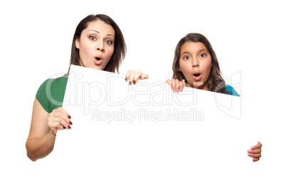 Pretty Hispanic Girl and Mother Holding Blank Board