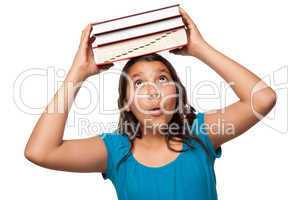 Pretty Hispanic Girl with Books on Her Head