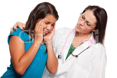 Unhappy Hispanic Girl and Concerned Female Doctor